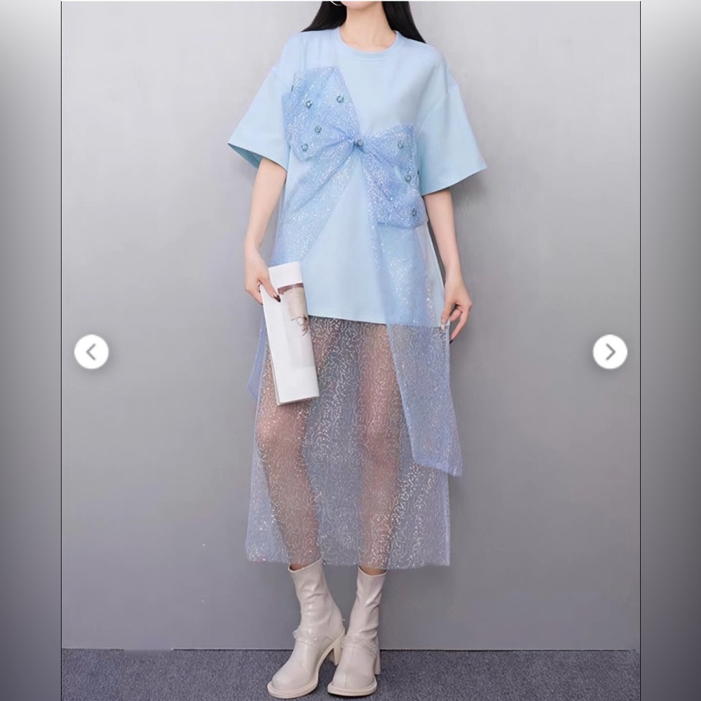 Elegant Light Blue t-shirt Dress with Sheer Sequin Overlay and mesh bow accent.